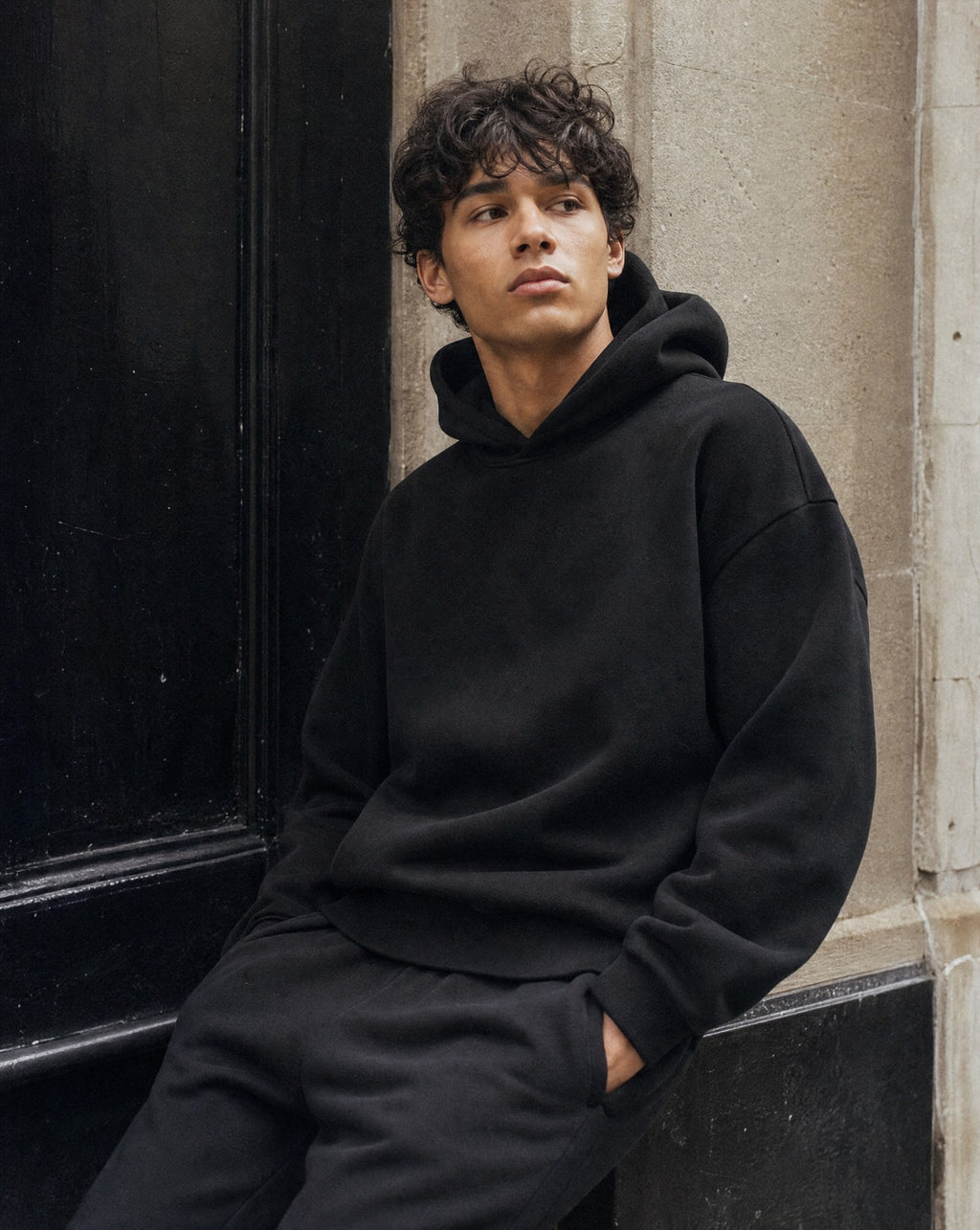 CORE Enzyme Treated Box Hoodie in Black - Lifestyle Image