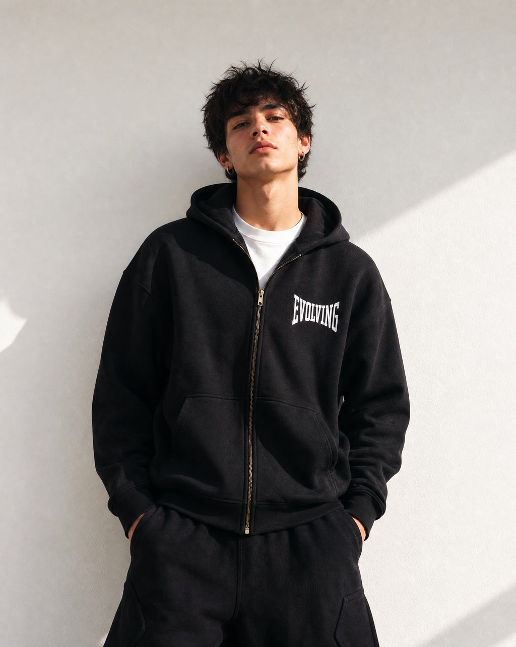 Evolving Boxy Zip Hoodie in Black - Editorial Image