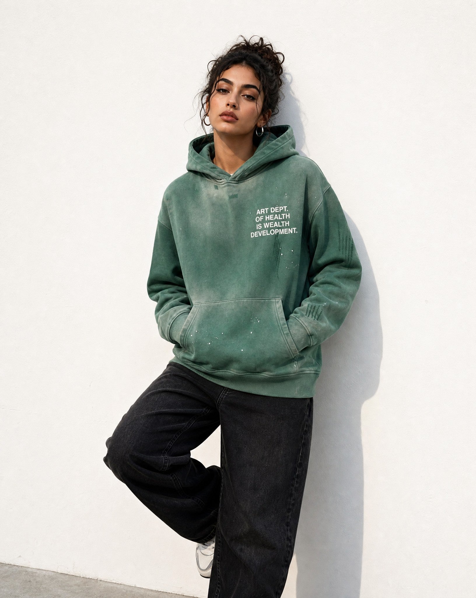 Health is Wealth Distressed Hoodie in Green - Editorial Image