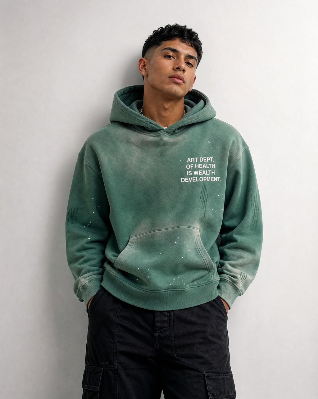Health is Wealth Distressed Hoodie in Green - Editorial Image