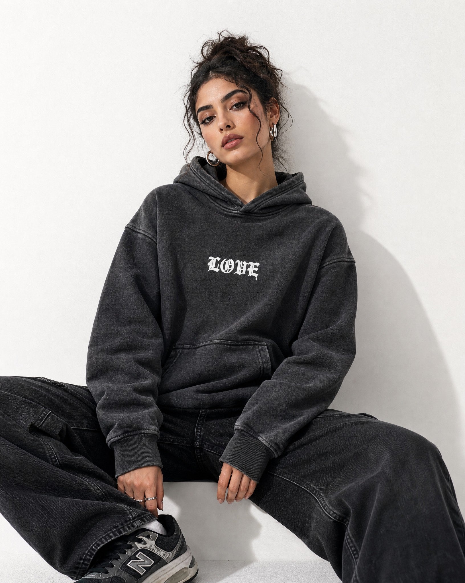Love Vintage Washed Hoodie in Black - Editorial Image