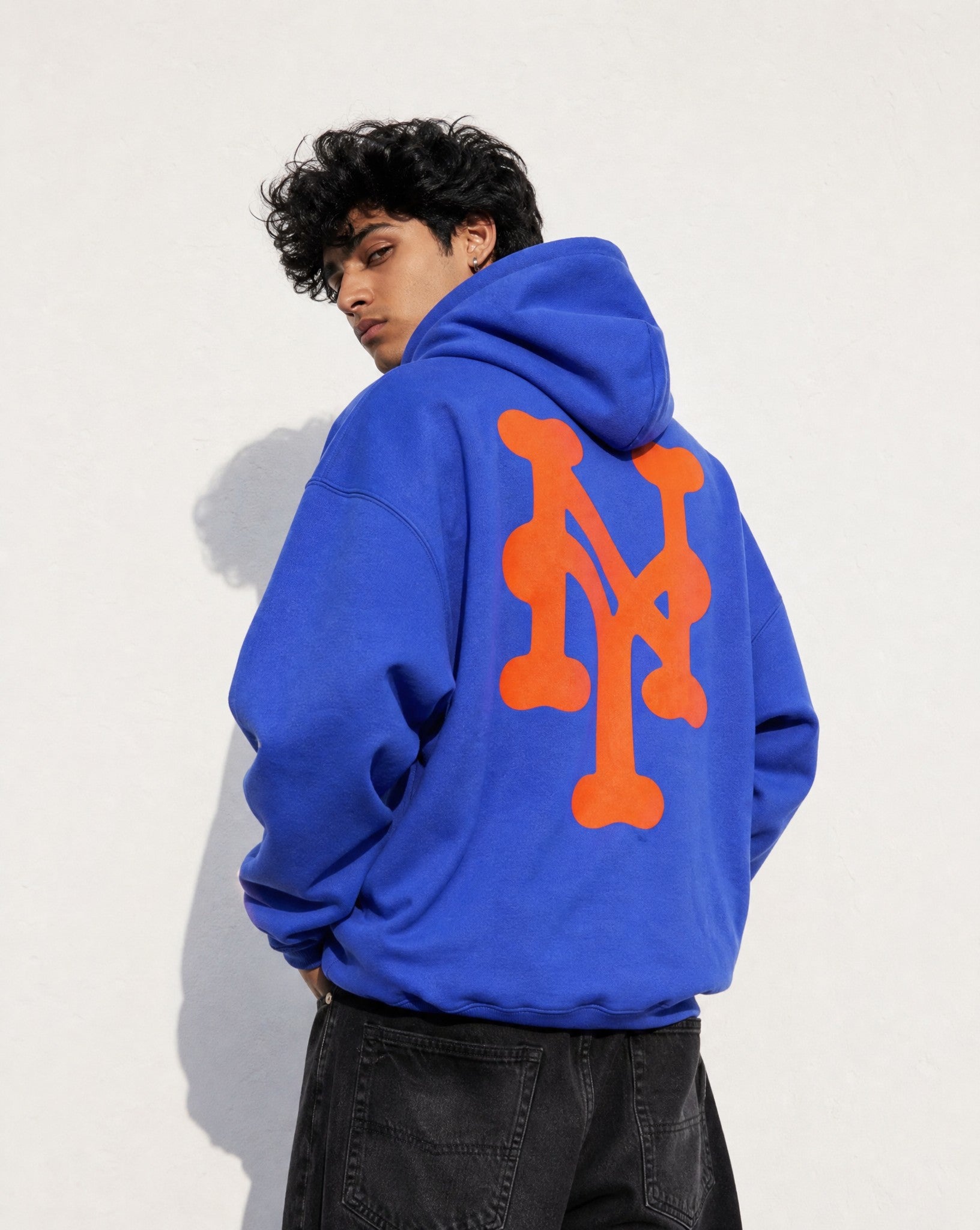 NY Queens Bootleg Hoodie in Blue -  Editorial Image