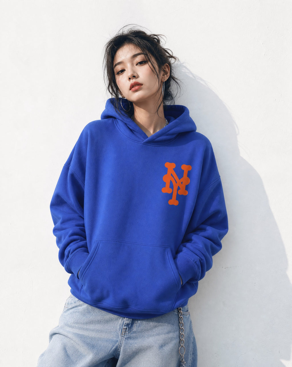 NY Queens Bootleg Hoodie in Blue -  Editorial Image
