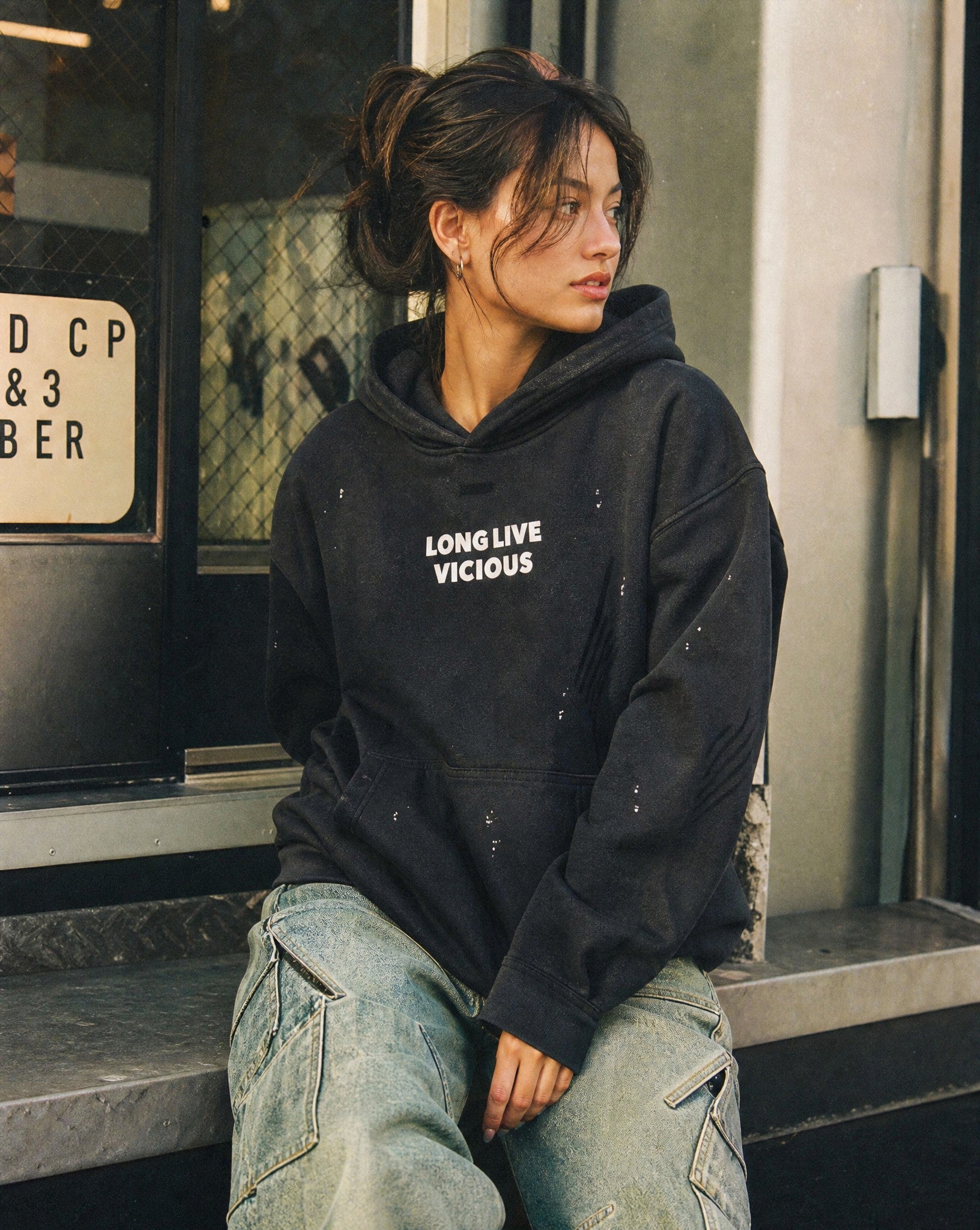 Vicious Distressed Hoodie in Black - Lifestyle Image