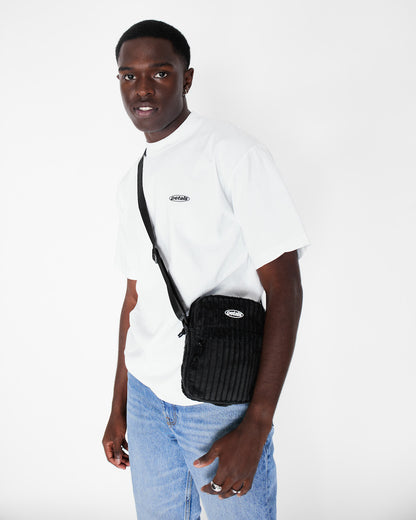 <transcy>Sac porté épaule en velours côtelé noir</transcy>